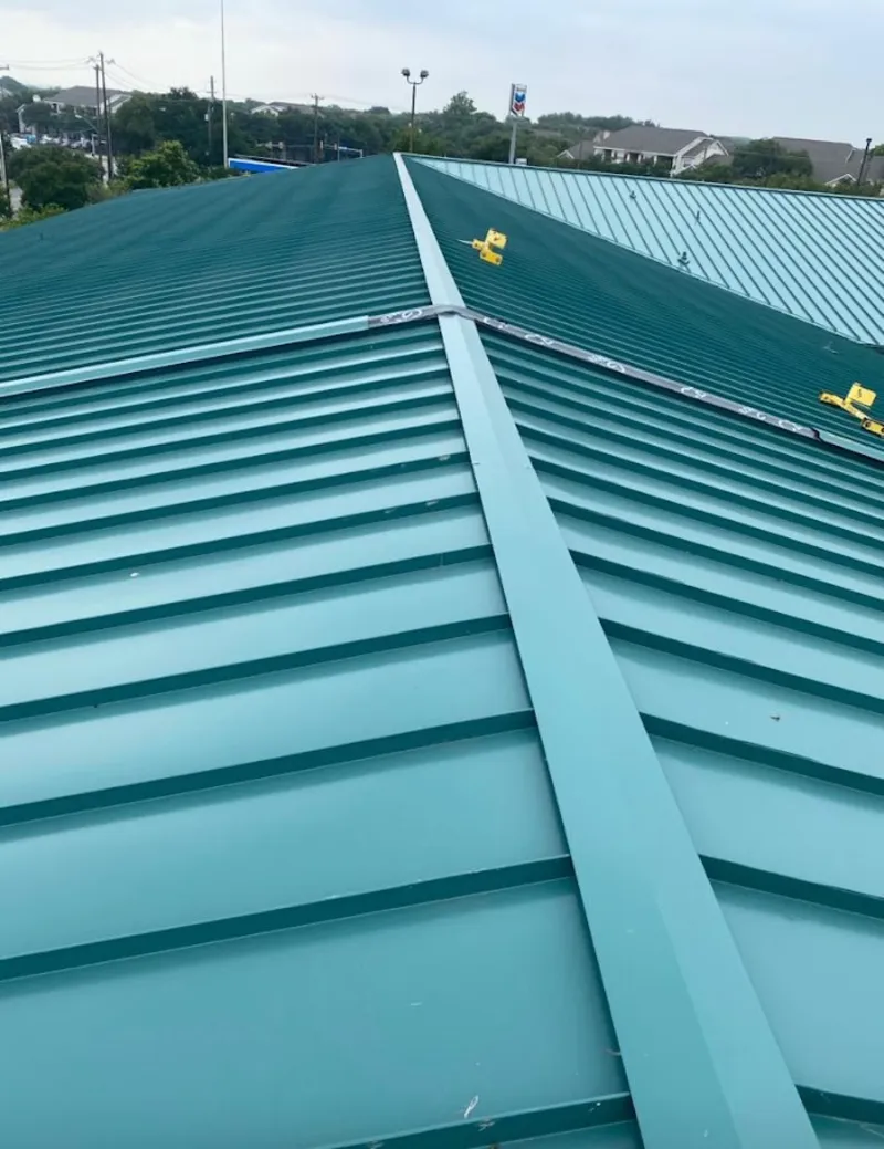 Green commercial metal roof ridge and valley for Metal Roof Repair in Laredo